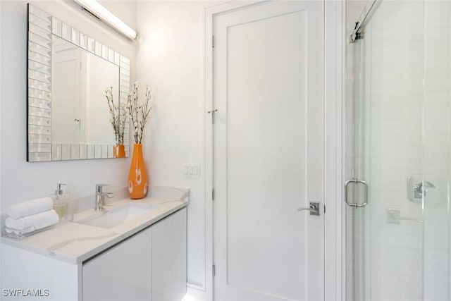 1167 22nd Ave N, Naples, FL 34103 - bathroom with vanity and a stall shower