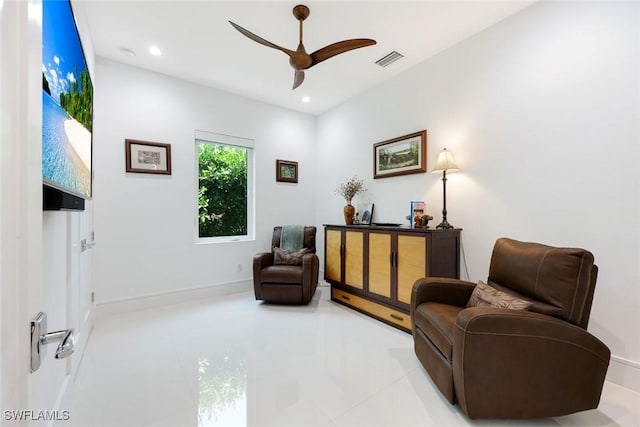 1167 22nd Ave N, Naples, FL 34103 - living area with a ceiling fan, tile patterned flooring, recessed lighting, and baseboards