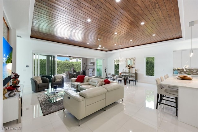 1167 22nd Ave N, Naples, FL 34103 - living area featuring wooden ceiling, light tile patterned floors, recessed lighting, and a chandelier