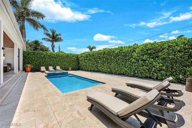 1167 22nd Ave N, Naples, FL 34103 - view of swimming pool with a patio and a pool with connected hot tub