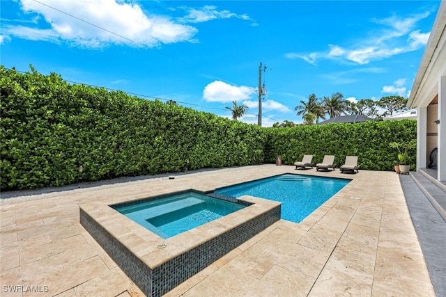 1167 22nd Ave N, Naples, FL 34103 - view of swimming pool featuring a patio area and a pool with connected hot tub