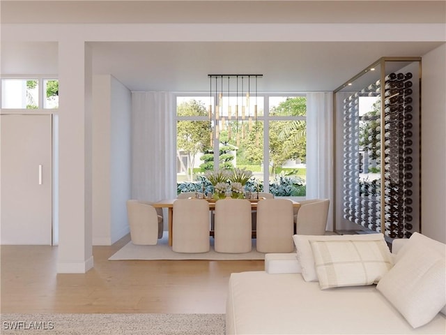 707 Buttonbush Ln, Naples, FL 34108 - dining area with baseboards and wood finished floors