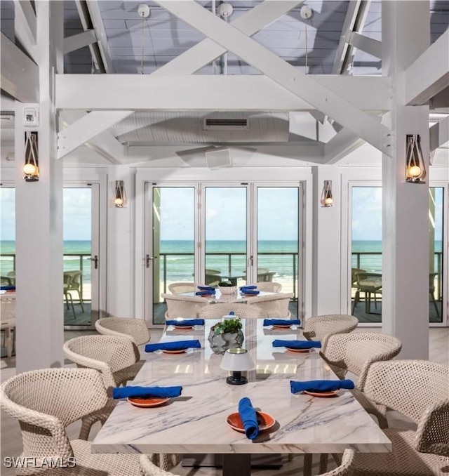 707 Buttonbush Ln, Naples, FL 34108 - sunroom / solarium with a water view