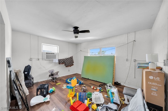 14260 Mcgregor Blvd, Fort Myers, FL 33919 - bedroom featuring cooling unit, wood finished floors, a ceiling fan, and baseboards