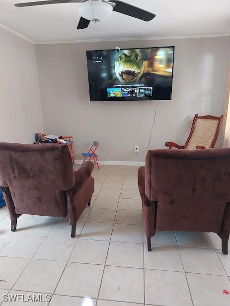 11421 Kimble Dr Unit 423, Fort Myers, FL 33908 - tiled living area featuring ornamental molding, a ceiling fan, and baseboards