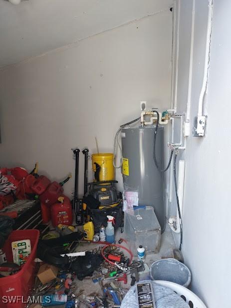 11421 Kimble Dr Unit 423, Fort Myers, FL 33908 - utility room with electric water heater