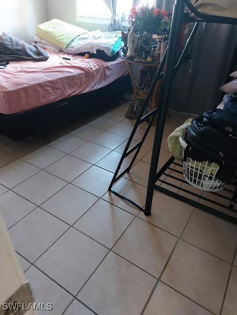 11421 Kimble Dr Unit 423, Fort Myers, FL 33908 - bedroom with tile patterned flooring