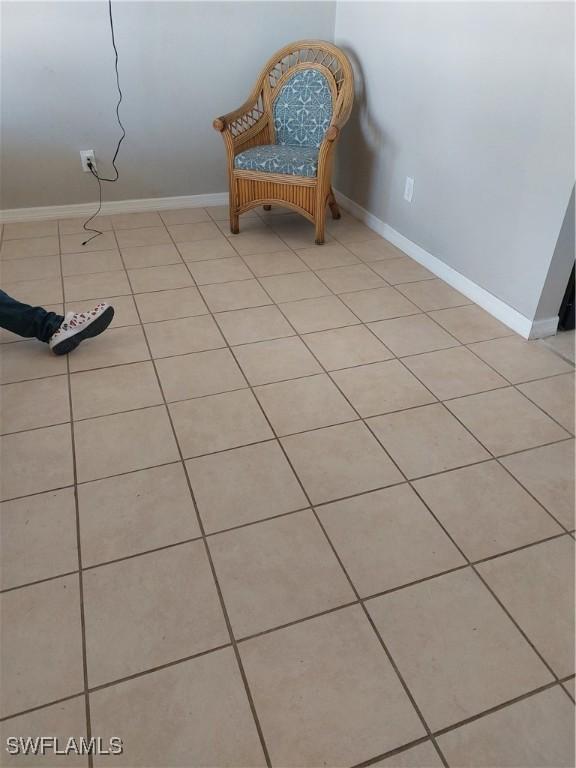 11421 Kimble Dr Unit 423, Fort Myers, FL 33908 - sitting room featuring baseboards and light tile patterned floors