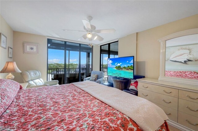 10562 Gulf Shore Dr Unit 402, Naples, FL 34108 - bedroom with access to outside, floor to ceiling windows, and a ceiling fan