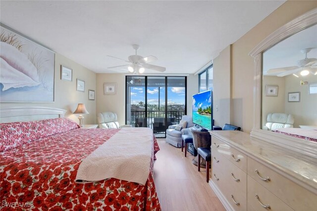 10562 Gulf Shore Dr Unit 402, Naples, FL 34108 - bedroom with access to outside, expansive windows, light wood finished floors, and ceiling fan