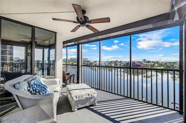 10562 Gulf Shore Dr Unit 402, Naples, FL 34108 - sunroom / solarium with a water view and a ceiling fan