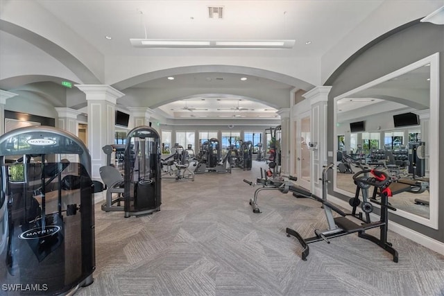 5979 Prosperity Ln, Ave Maria, FL 34142 - exercise room featuring ornate columns, carpet floors, recessed lighting, arched walkways, and french doors