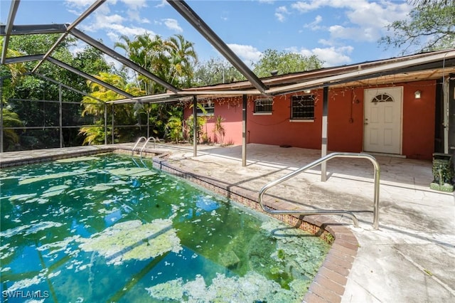 1400 Billie St, Fort Myers, FL 33916 - swimming pool featuring a patio area and glass enclosure