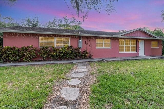 1400 Billie St, Fort Myers, FL 33916 - ranch-style house featuring a front yard and stucco siding