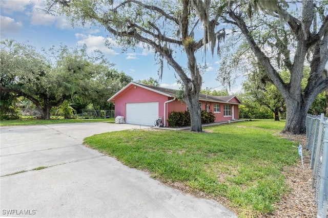 1400 Billie St, Fort Myers, FL 33916 - single story home with an attached garage, driveway, and stucco siding
