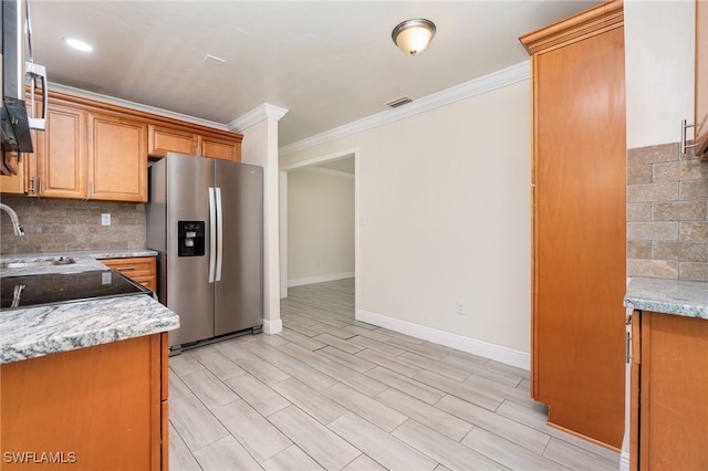 1400 Billie St, Fort Myers, FL 33916 - kitchen featuring stainless steel appliances, ornamental molding, tasteful backsplash, baseboards, and a sink
