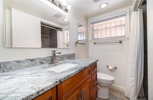 1400 Billie St, Fort Myers, FL 33916 - full bathroom with vanity, toilet, baseboards, curtained shower, and recessed lighting
