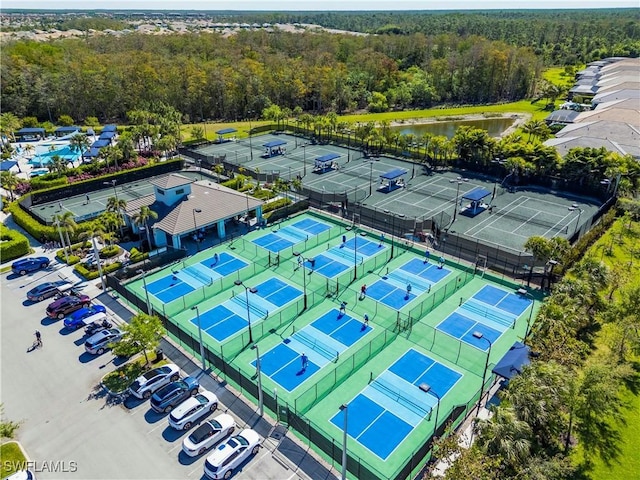 28648 Lobos Cir, Bonita Springs, FL 34135 - bird's eye view of a heavily wooded area and a large body of water