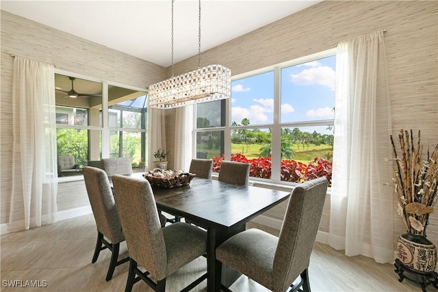 28648 Lobos Cir, Bonita Springs, FL 34135 - dining room featuring plenty of natural light and ceiling fan