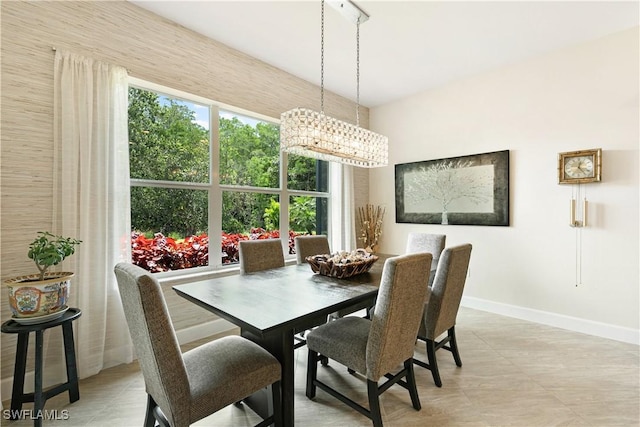 28648 Lobos Cir, Bonita Springs, FL 34135 - dining area featuring baseboards and light tile patterned floors