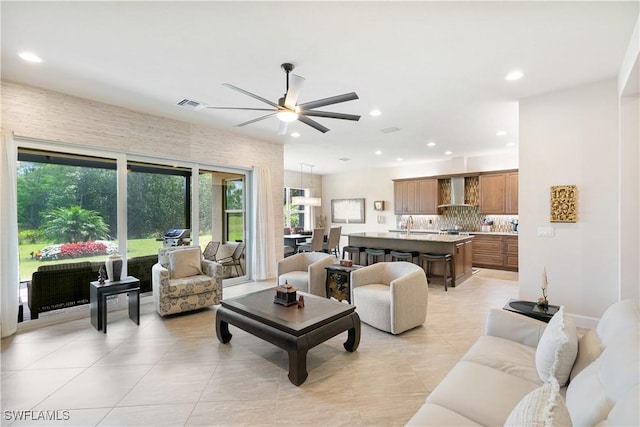 28648 Lobos Cir, Bonita Springs, FL 34135 - living area with a ceiling fan, light tile patterned floors, and recessed lighting