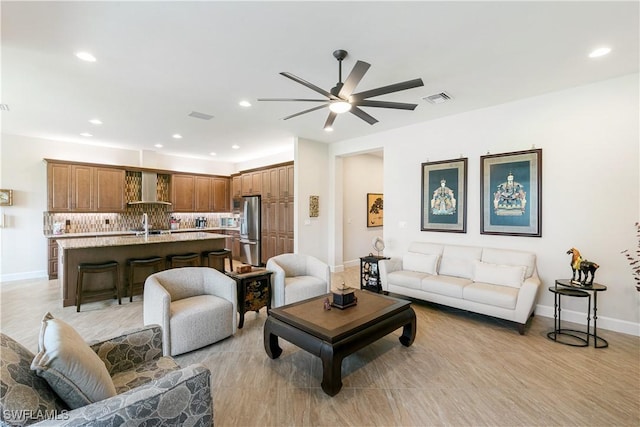 28648 Lobos Cir, Bonita Springs, FL 34135 - living area with a ceiling fan, recessed lighting, and baseboards