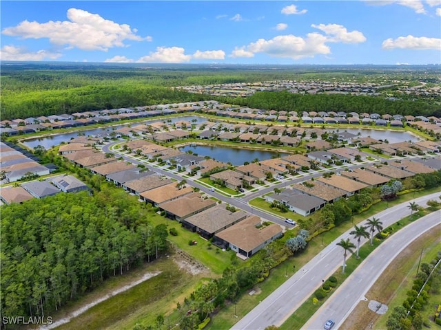 28648 Lobos Cir, Bonita Springs, FL 34135 - view of property location featuring nearby suburban area, a large body of water, and a heavily wooded area