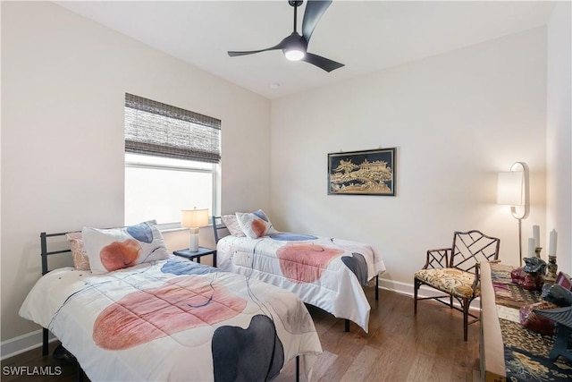 28648 Lobos Cir, Bonita Springs, FL 34135 - bedroom with baseboards, wood finished floors, and ceiling fan