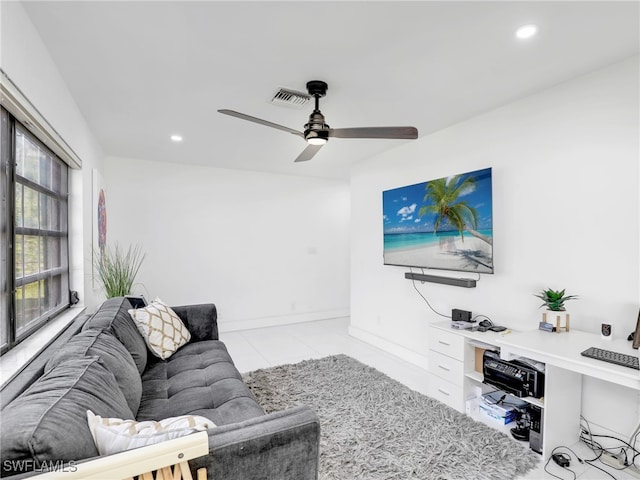 208 Erie Dr, Naples, FL 34110 - living room featuring ceiling fan, recessed lighting, light tile patterned flooring, and baseboards