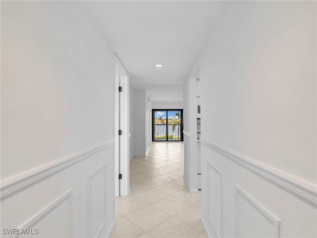 750 W Elkcam Cir Unit 312, Marco Island, FL 34145 - corridor with light tile patterned floors and recessed lighting