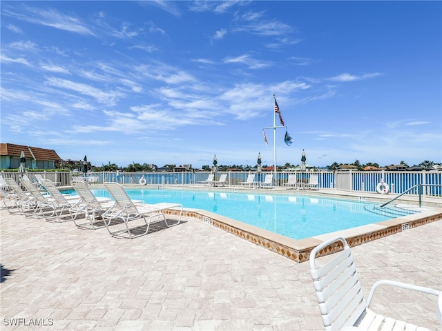 750 W Elkcam Cir Unit 312, Marco Island, FL 34145 - community pool with a patio area