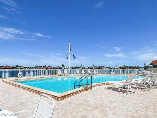 750 W Elkcam Cir Unit 312, Marco Island, FL 34145 - community pool with a patio