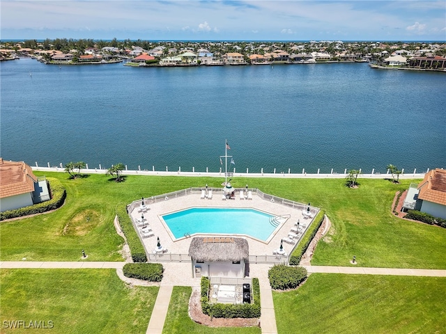 750 W Elkcam Cir Unit 312, Marco Island, FL 34145 - drone / aerial view of a pool and a nearby body of water