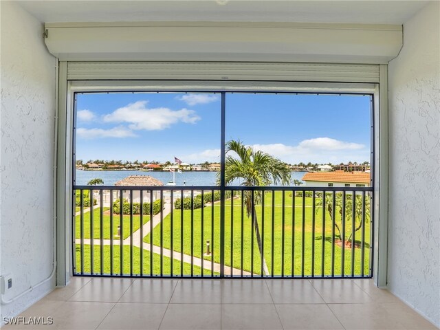 750 W Elkcam Cir Unit 312, Marco Island, FL 34145 - unfurnished sunroom with a water view