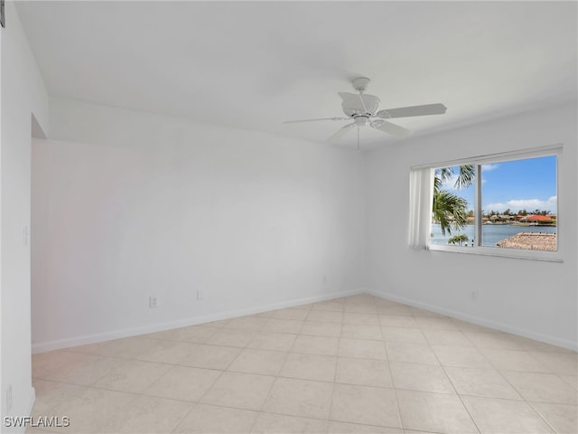750 W Elkcam Cir Unit 312, Marco Island, FL 34145 - empty room featuring a ceiling fan and a water view