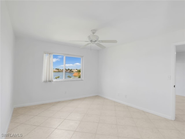 750 W Elkcam Cir Unit 312, Marco Island, FL 34145 - spare room featuring ceiling fan and a water view