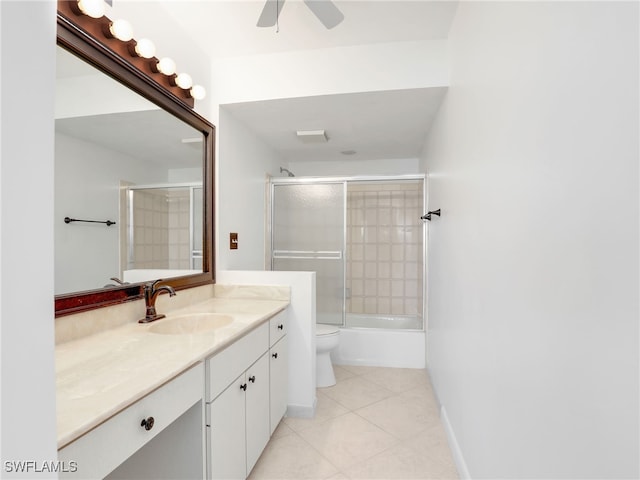 750 W Elkcam Cir Unit 312, Marco Island, FL 34145 - bathroom with tile patterned flooring, vanity, a ceiling fan, and shower / bath combination with glass door