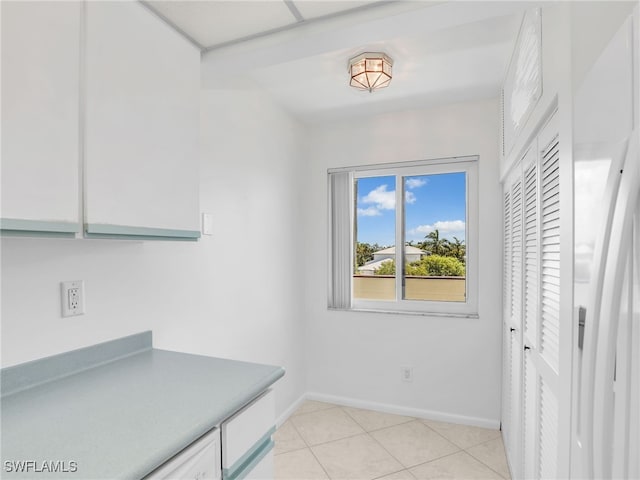 750 W Elkcam Cir Unit 312, Marco Island, FL 34145 - interior space featuring baseboards and light tile patterned floors