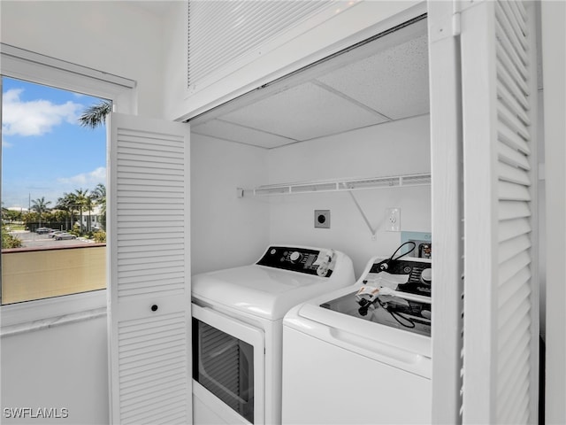 750 W Elkcam Cir Unit 312, Marco Island, FL 34145 - washroom with independent washer and dryer