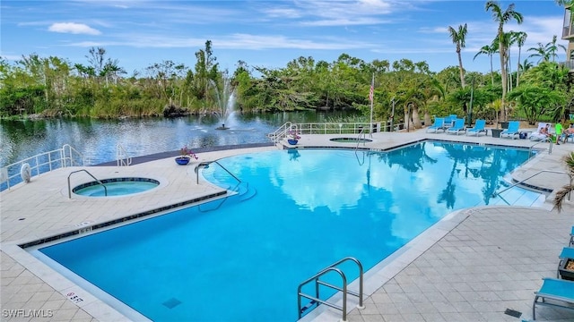 14300 Riva Del Lago Dr Unit 2103, Fort Myers, FL 33907 - community pool with a hot tub, a water view, and a patio area