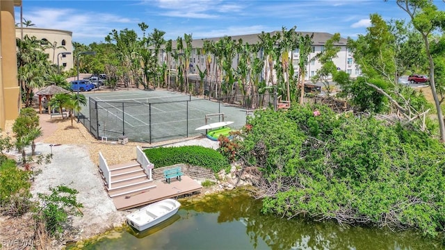 14300 Riva Del Lago Dr Unit 2103, Fort Myers, FL 33907 - view of tennis court featuring a water view