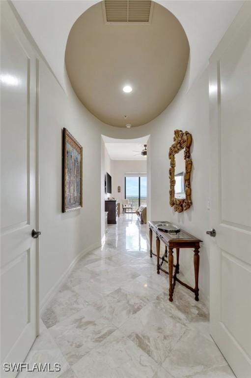 14300 Riva Del Lago Dr Unit 2103, Fort Myers, FL 33907 - hall featuring light marble finish floors and baseboards