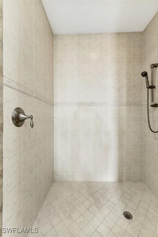 14300 Riva Del Lago Dr Unit 2103, Fort Myers, FL 33907 - full bathroom with tiled shower and tile patterned flooring