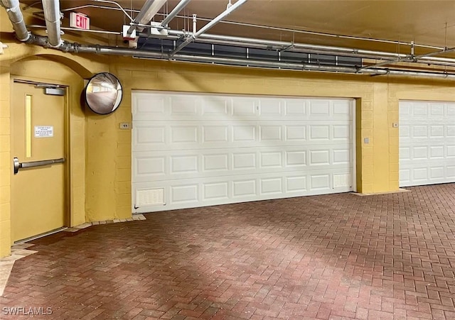 6081 Silver King Blvd Unit 704, Cape Coral, FL 33914 - view of garage