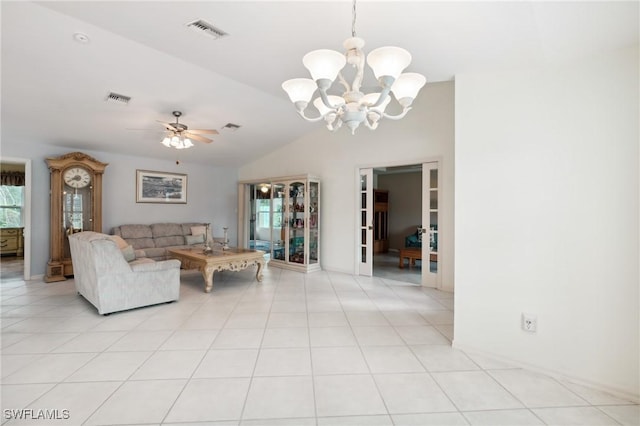 877 Charlemagne Blvd, Naples, FL 34112 - living room featuring a chandelier, plenty of natural light, vaulted ceiling, ceiling fan, and french doors