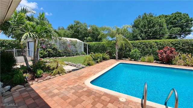 204 Flagler St, Clewiston, FL 33440 - view of pool featuring a fenced backyard and a patio