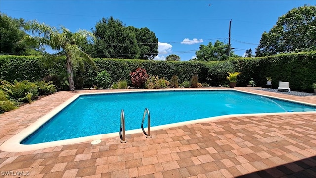 204 Flagler St, Clewiston, FL 33440 - view of swimming pool with a fenced backyard and a patio