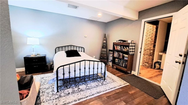 204 Flagler St, Clewiston, FL 33440 - bedroom featuring wood finished floors, baseboards, and beamed ceiling