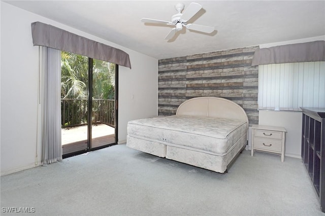 27910 Hacienda E Blvd Unit 201B, Bonita Springs, FL 34135 - carpeted bedroom with an accent wall, access to exterior, and a ceiling fan