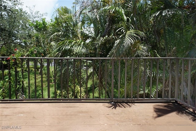 27910 Hacienda E Blvd Unit 201B, Bonita Springs, FL 34135 - view of wooden balcony with a wooden deck